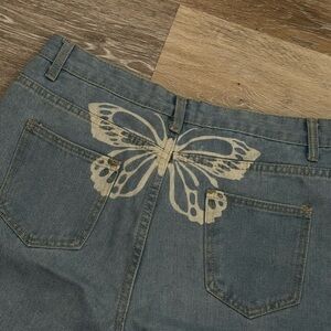 Butterfly Print Distressed Denim Jeans